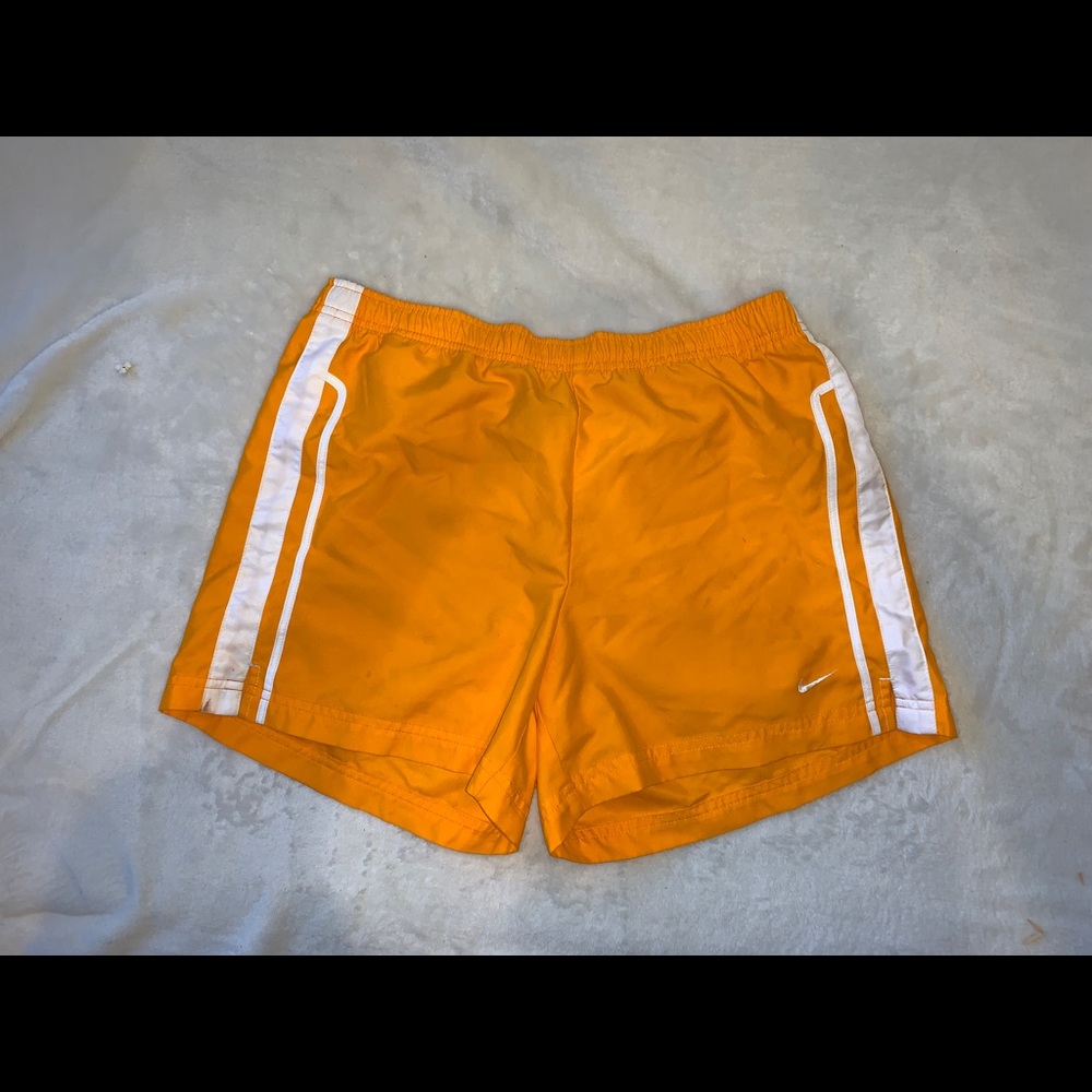 Vintage Yellow Nike short shorts 18 hip to hip, 13 inches top to bottom